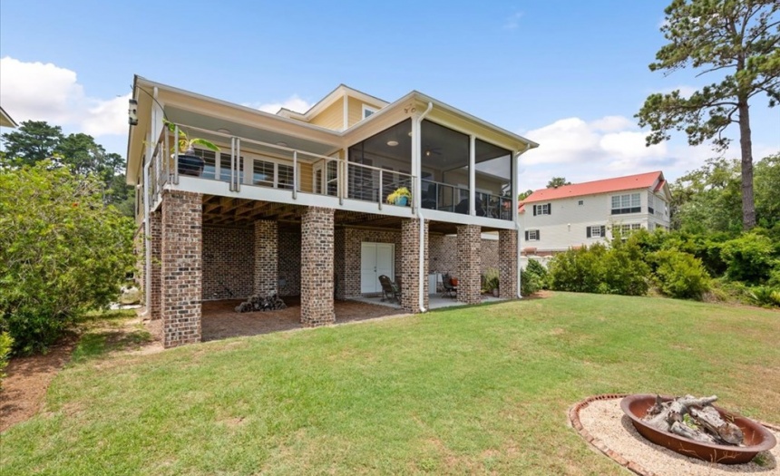 Rear View of the Home and Backyard