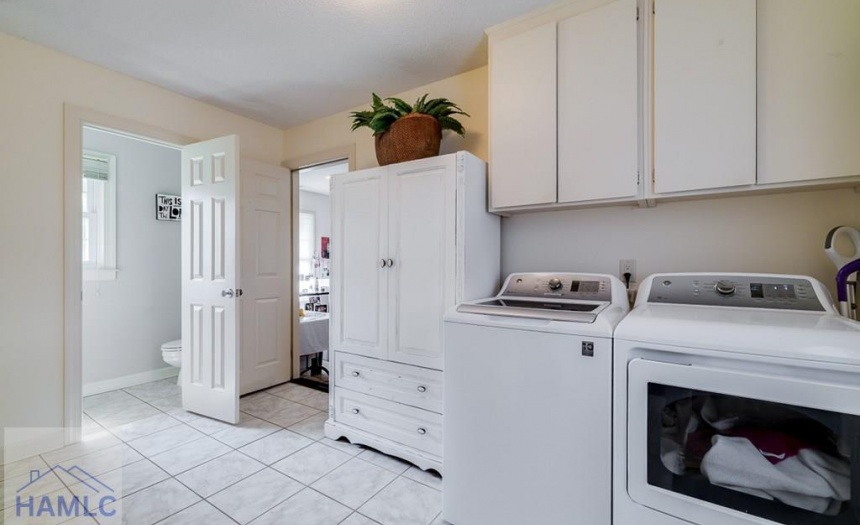 Laundry leads to powder room and FLEX room