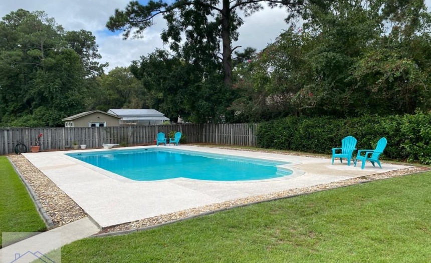 Fabulous inground pool on .52 acre lot!